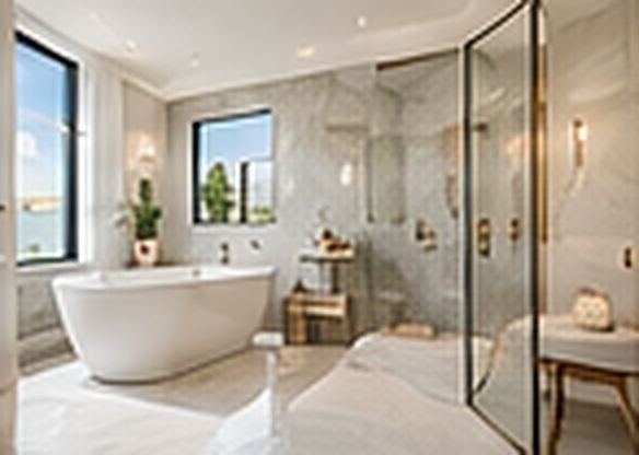 Bright bathroom with a tub and glass shower
